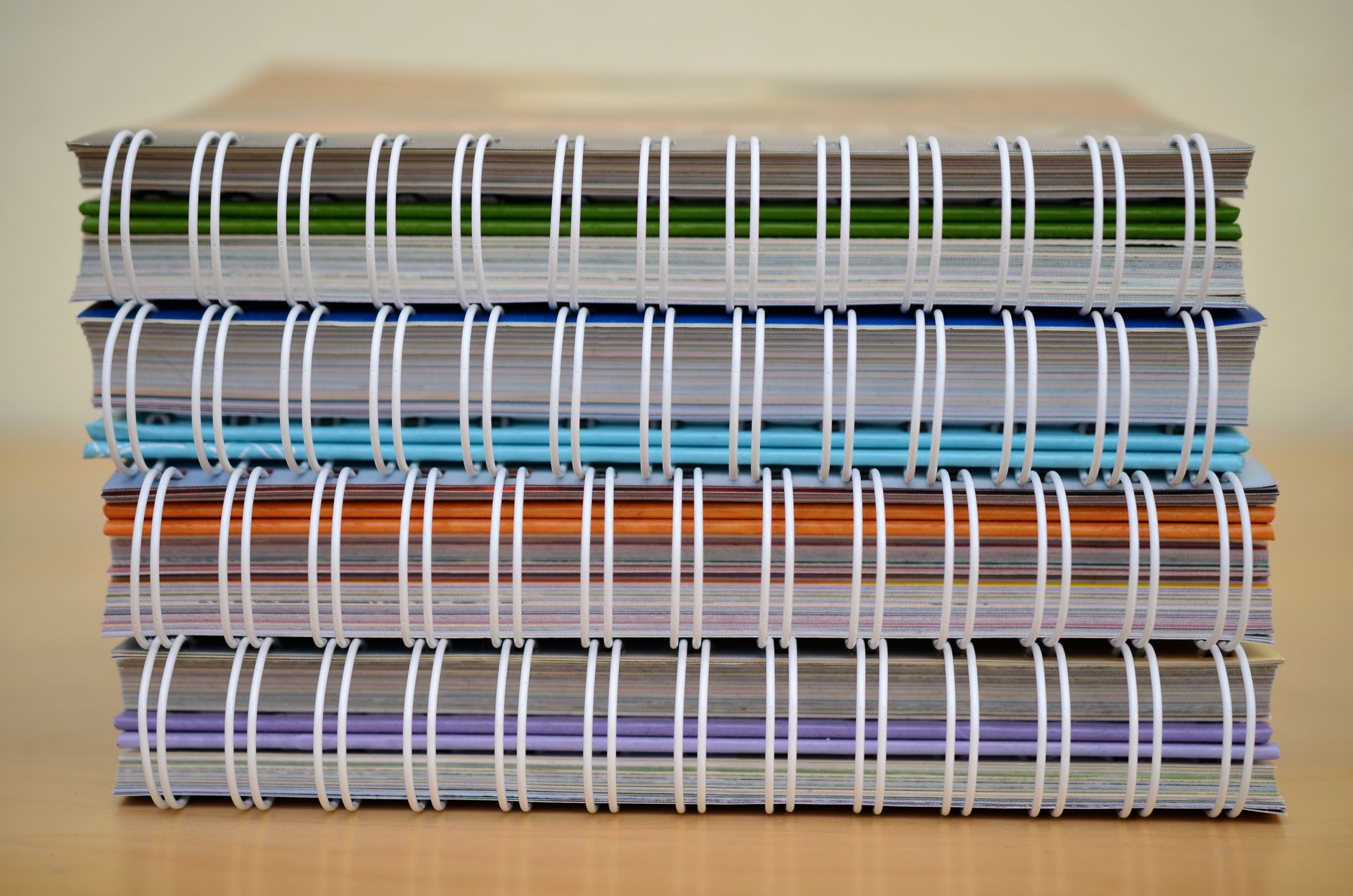 piled of spring notebooks
